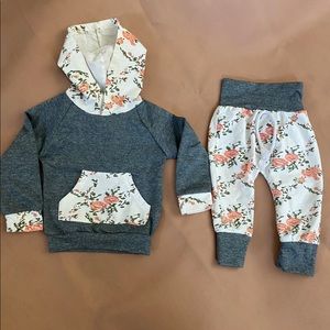 Matching floral and grey sweatshirts and pants